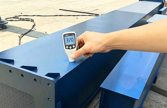 Main beam with high-strength steel and marine coating protection