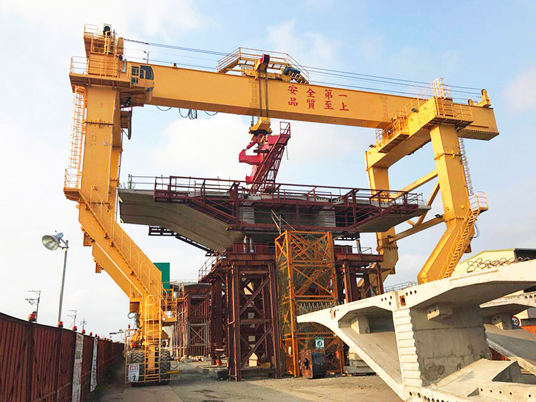 On-site precast girder installation with specialized lifting system