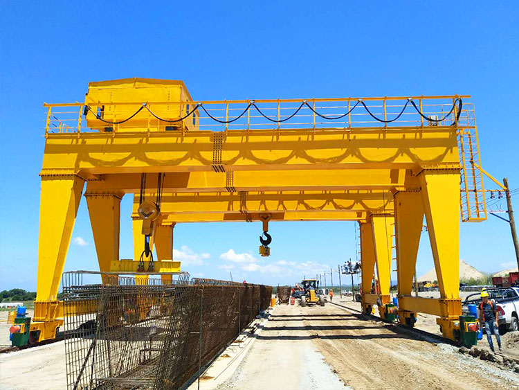Precast concrete lifting in production yard using spreader beam