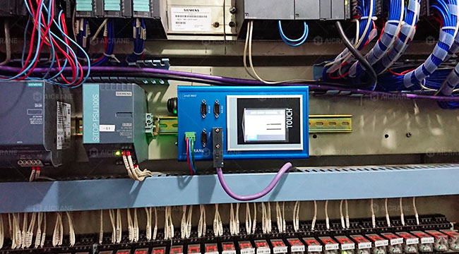 RTG anti-sway system controlling load motion under wind and dynamic lifting conditions