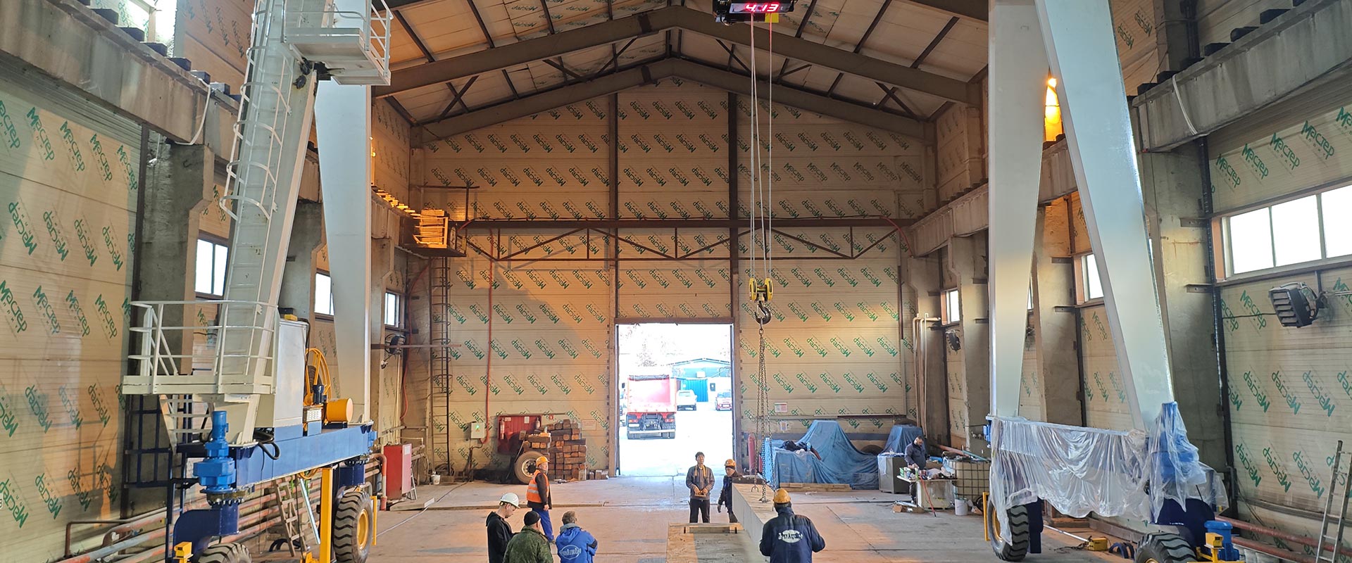 RTG crane operating safely in an industrial workshop