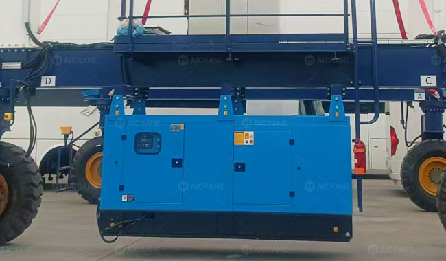 RTG crane with low-mounted power unit and control cabinet reducing center of gravity