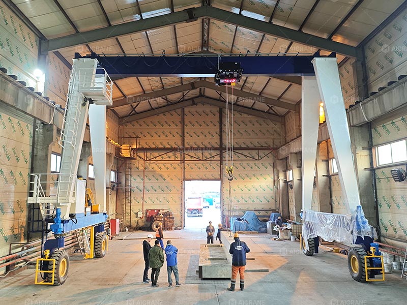 Single girder rubber tyred crane inside a workshop for flexible lifting
