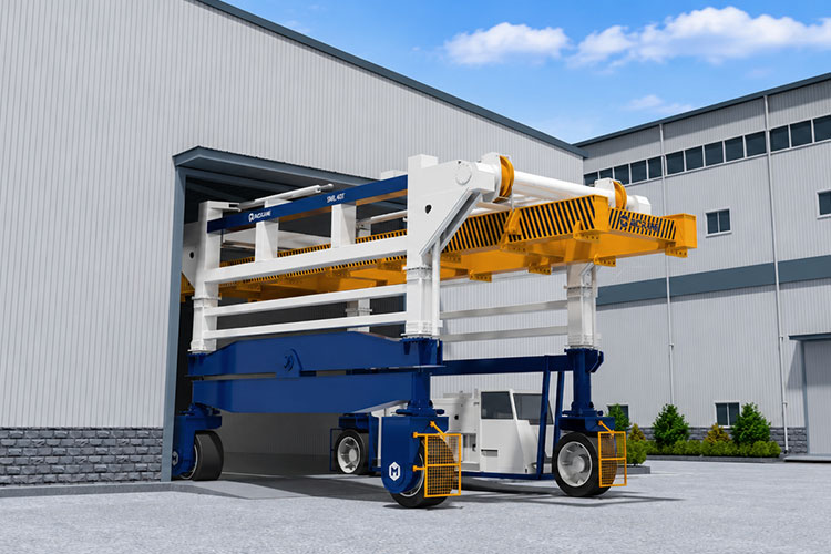 Straddle carrier passing through a low-clearance workshop