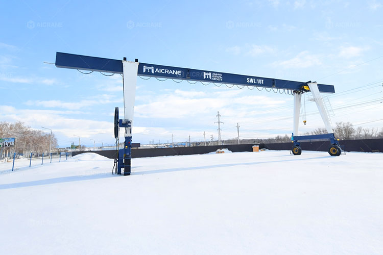 Double-side cantilever RTG crane structure for extended working coverage