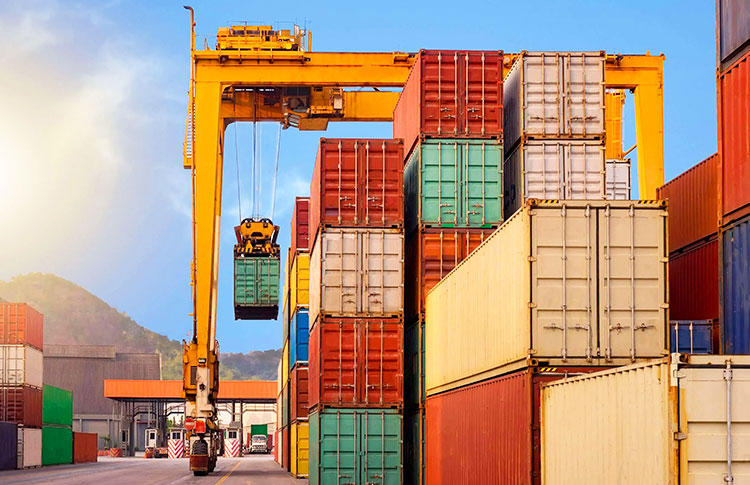 RTG crane handling containers in a container storage yard