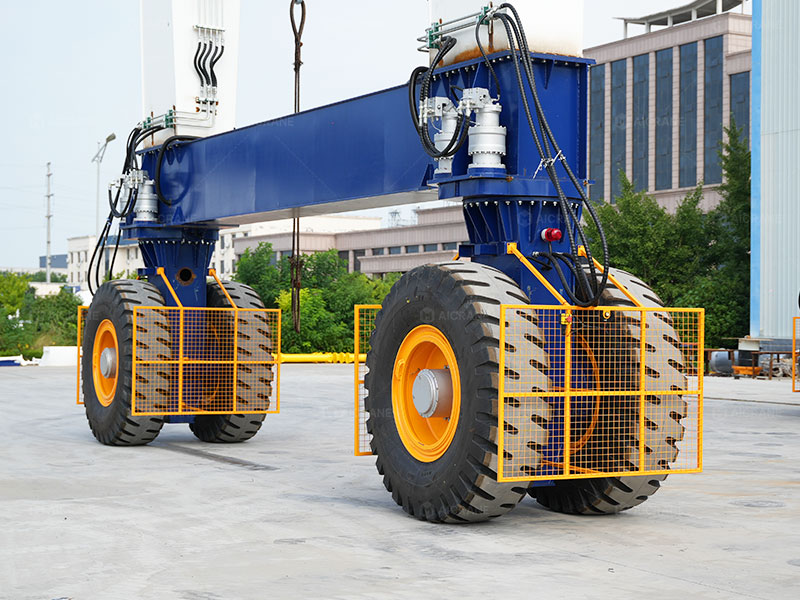RTG crane travel system with protected mechanical components for long-term reliability