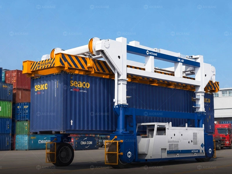 Straddle carrier lifting and transporting containers in a terminal yard