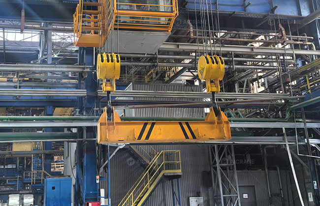 overhead crane with special lifting attachment for workshop material handling
