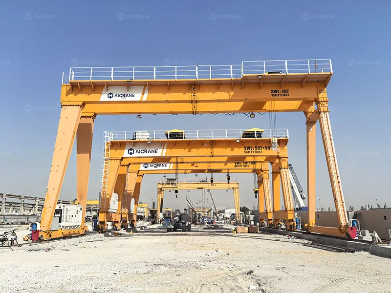 Gantry crane handling precast concrete components in a fabrication yard
