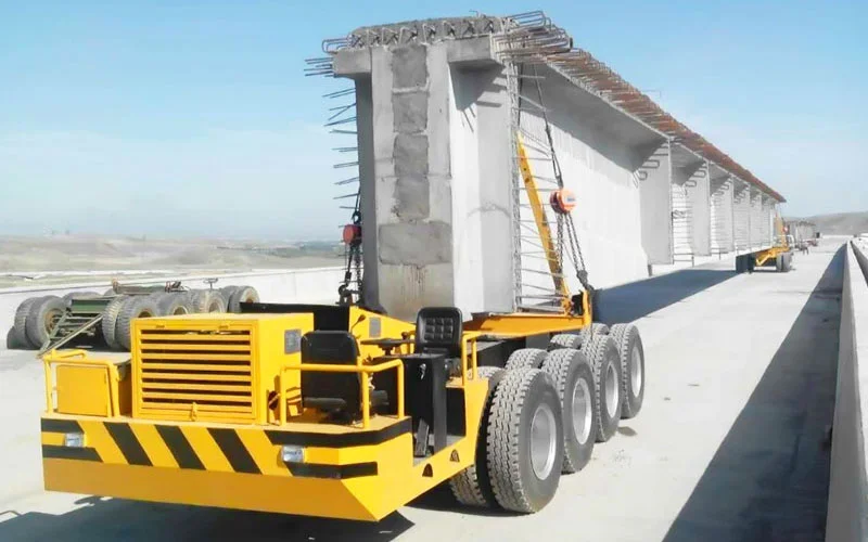 Self propelled hydraulic transporter for bridge girder and precast structure transportation