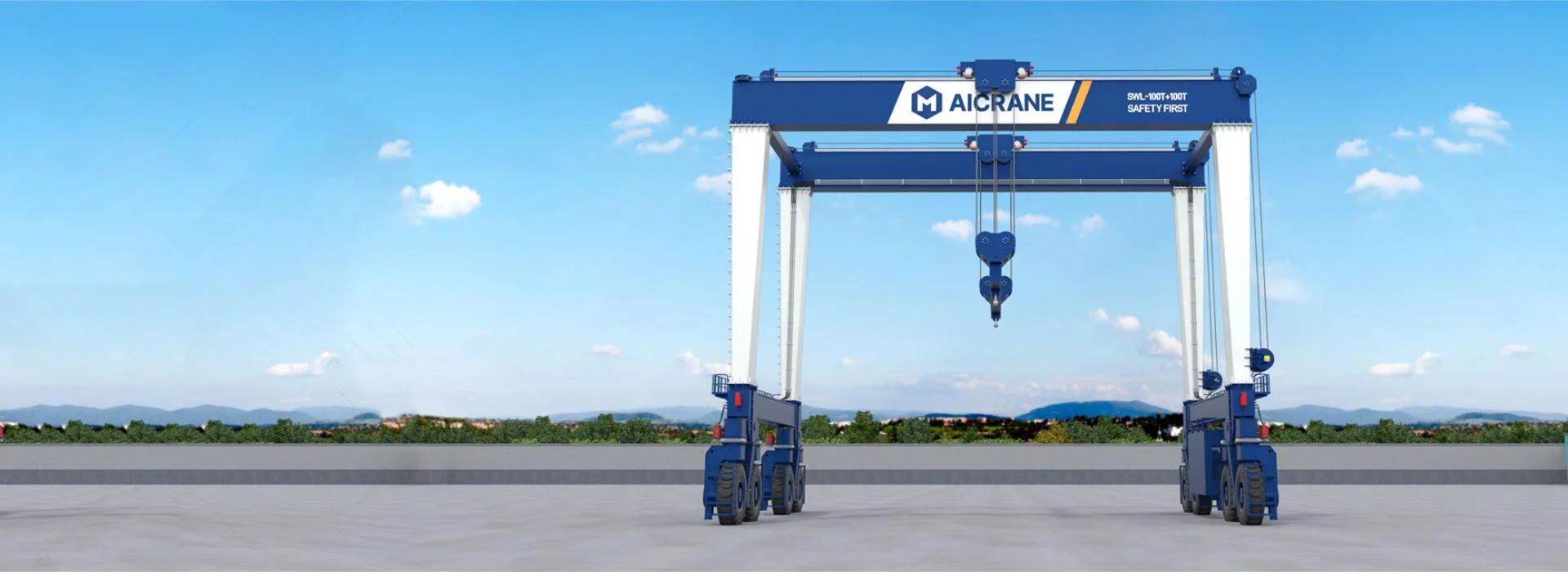 YTL hydraulic rubber tyred gantry crane lifting heavy components in an industrial yard